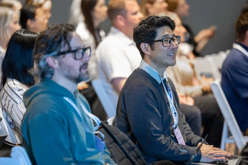 Attendees listening to a session at Demand & Expand 2026